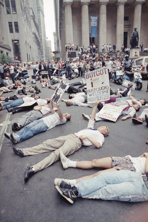Demonstrators in front of the New York Stock Exchange in 1989 protesting the high cost of the AIDS drug AZT. The protest was organized by the militant group Act Up, of which Mr. Kramer was a founder.
